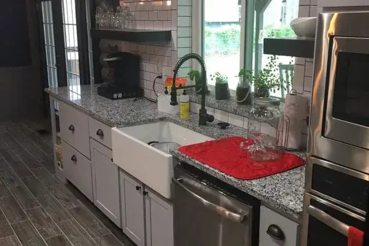 Modern Farmhouse Kitchen Remodel in Claremore, OK by C&A Roofing & Construction project photo