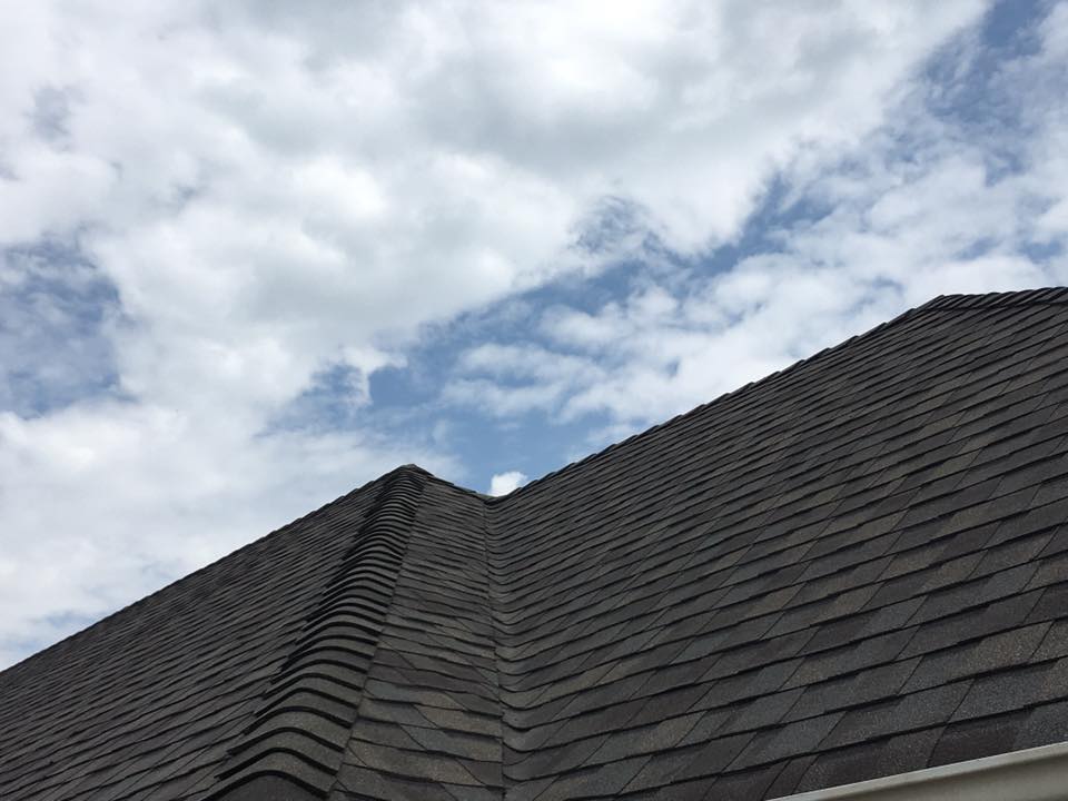 Roof repair and maintenance work in progress