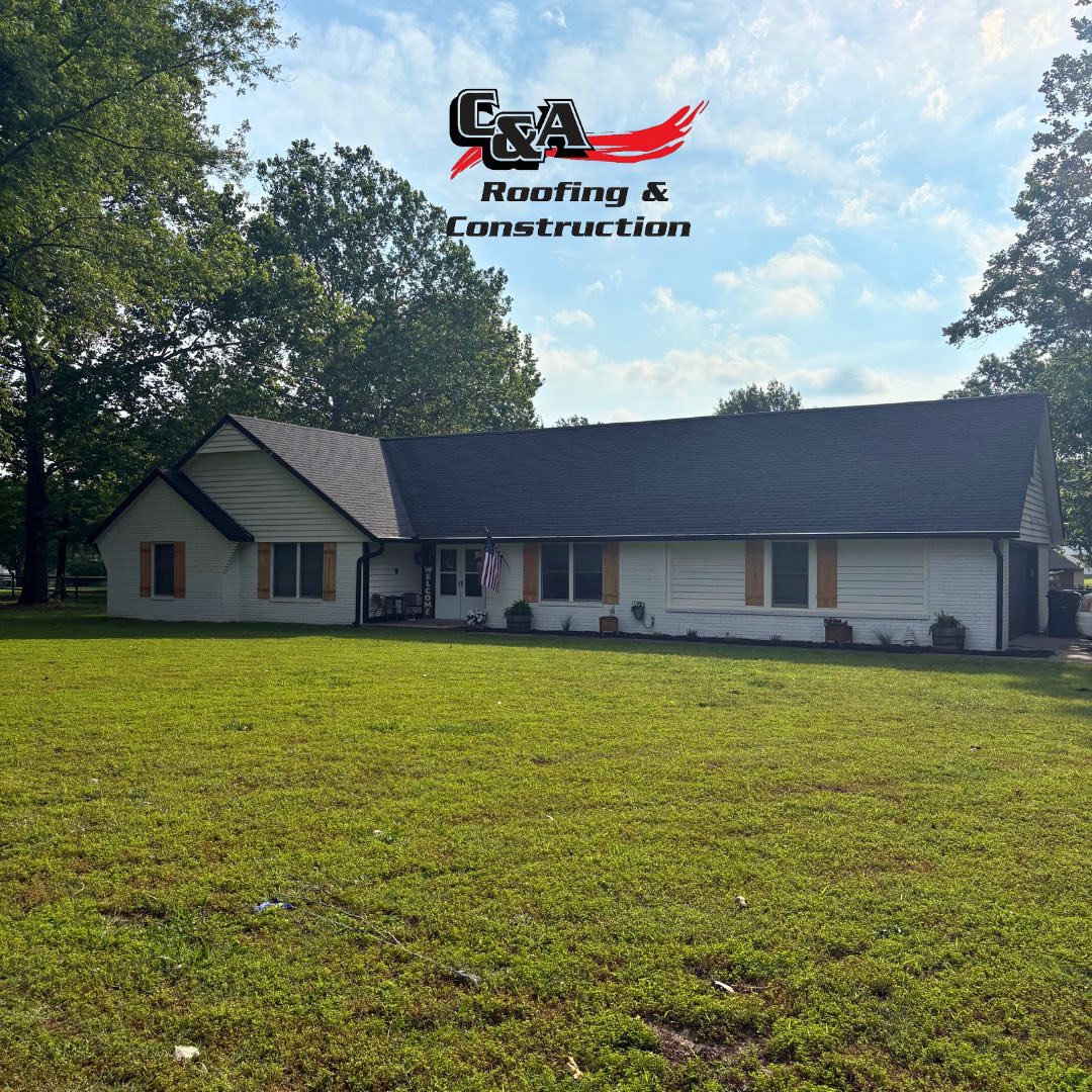 Completed residential roof with C&A branding